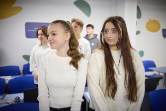 Students learning in a phone-free classroom during a lesson