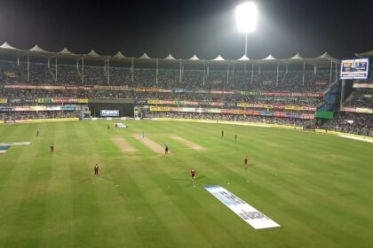 cricket stadium floodlights photo illustrating Rashid Khan