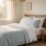 A peaceful bedroom in soft morning light with a neatly made bed